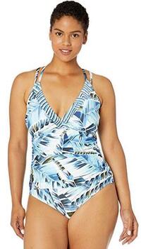 a woman going for a swim in the best bathing suits for large bust